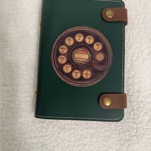 Vintage-Inspired Green Journal with Phone Design